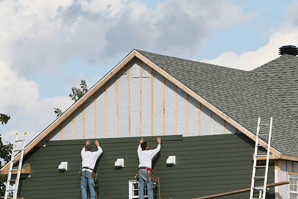 Professional Storm Damage Siding Repair technician working in Bruington, VA